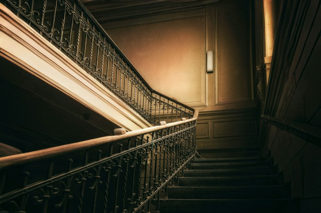 Dark stairwell curving upward