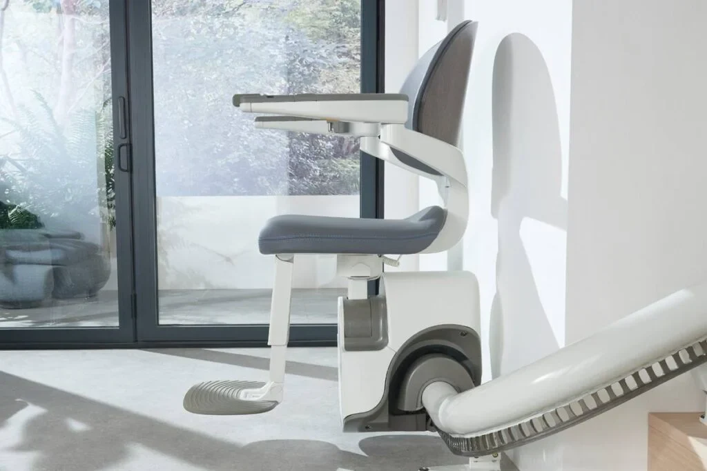 Flow X stair lift following the curves of a staircase
